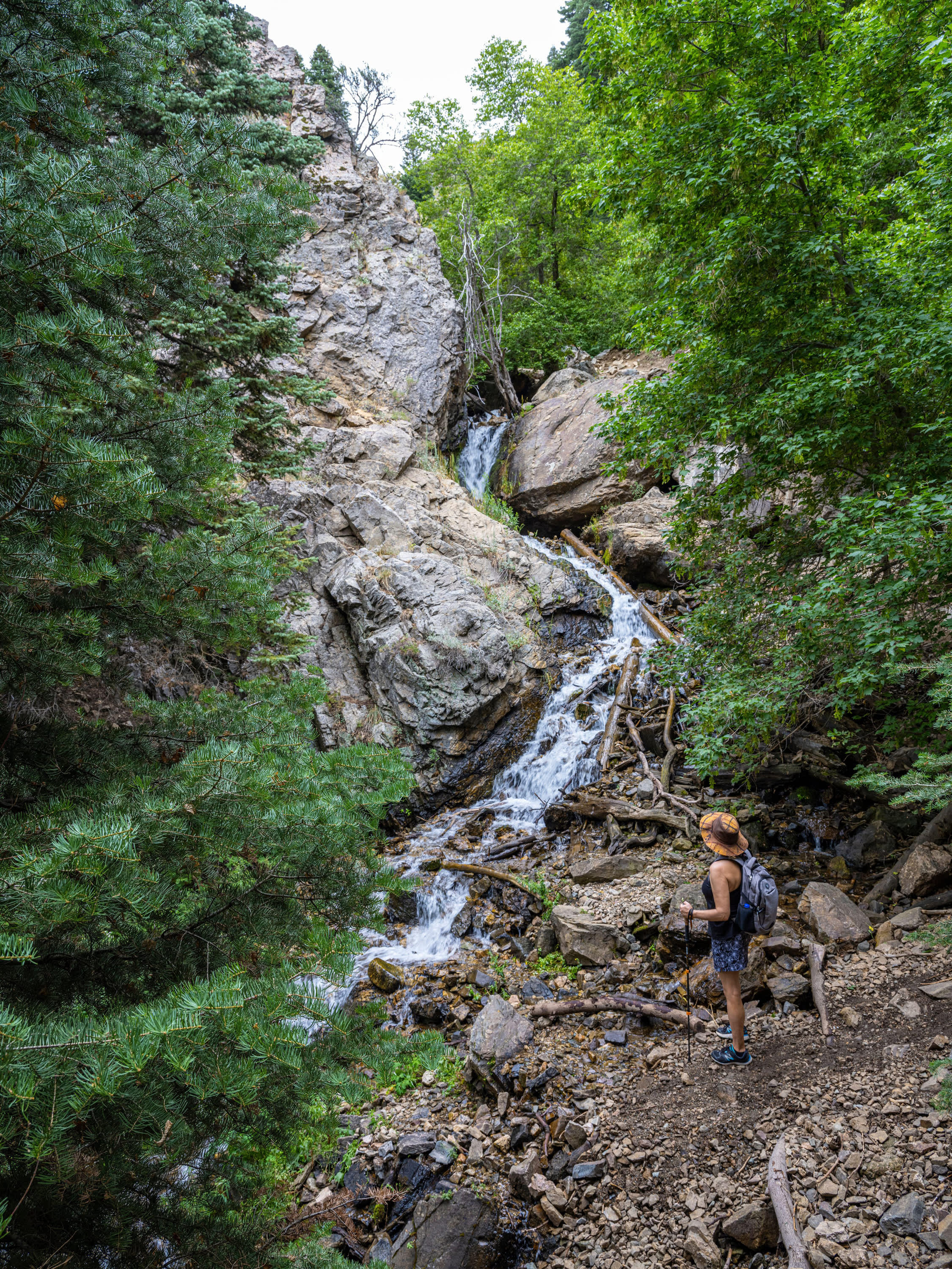 A hiker watches a stream along Adams Canyon Trail, near Layton, Utah.