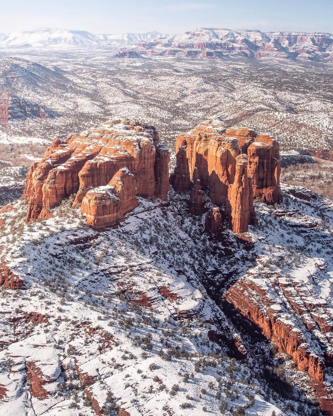 Snow covers the red rocks in Sedona, Arizona.