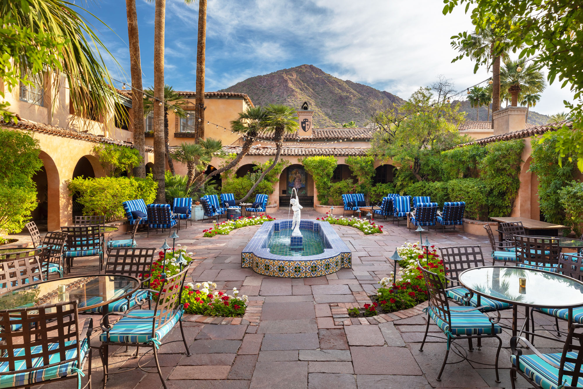 A water feature in the courtyard at Royal Palms Resort and Spa with Camelback Mountain in the background.