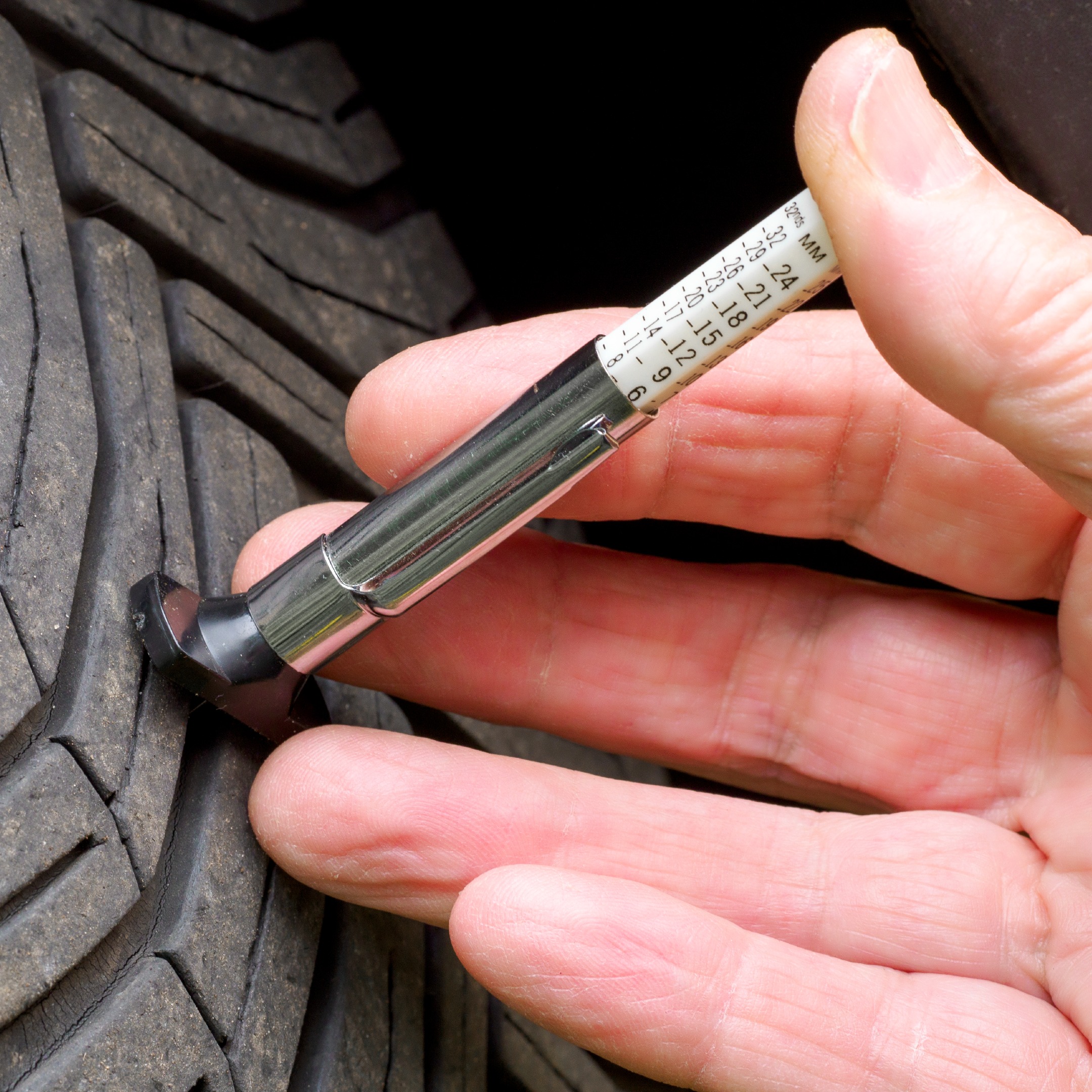 check your tires using a manual tread depth gauge