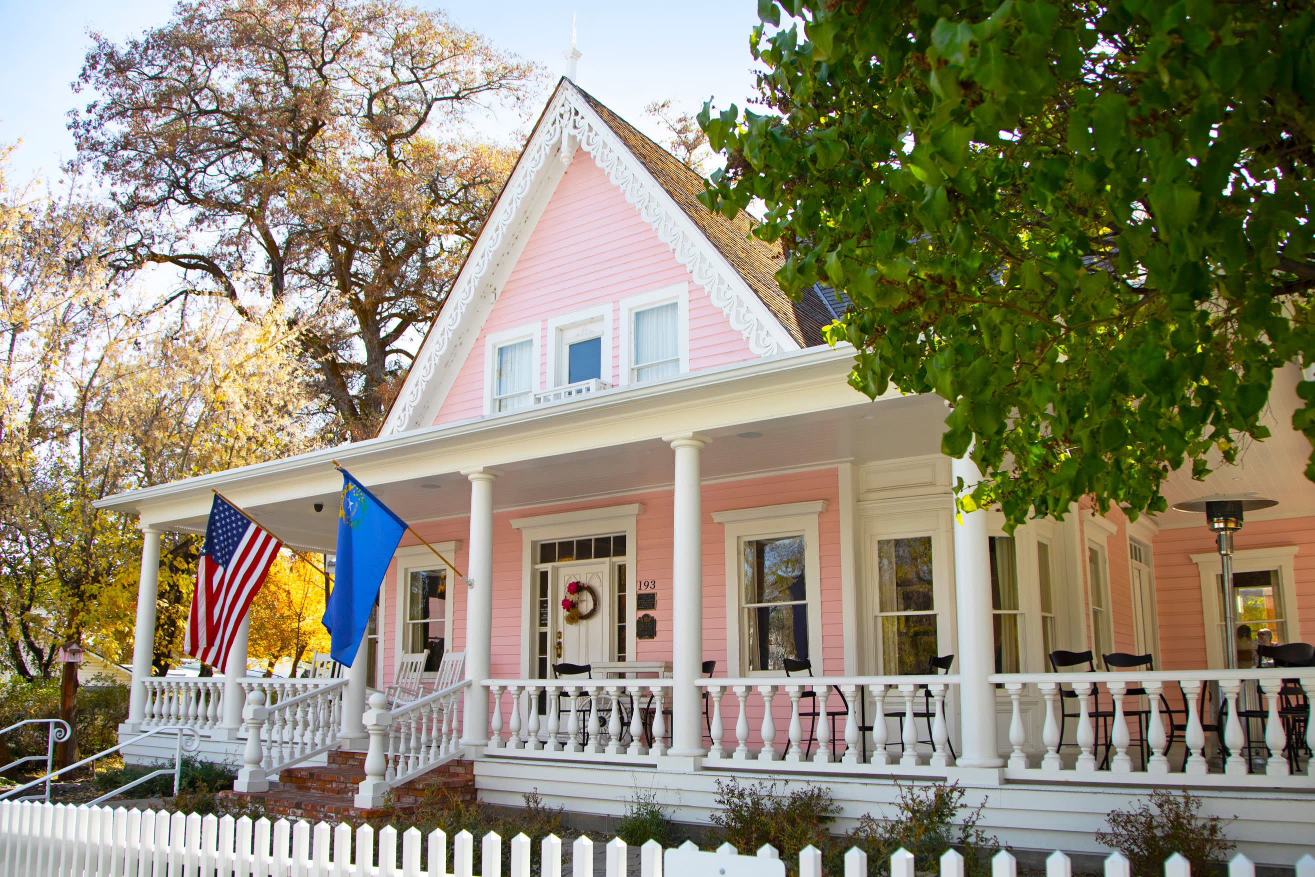 Flags fly outside of the Pink House in Genoa, Nevada.